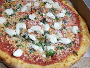 Deliworks Pizzeria margarita pizza
